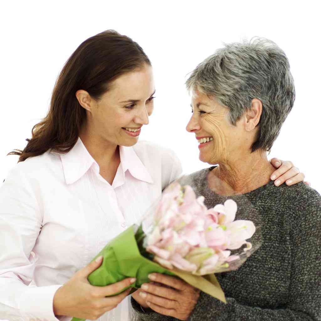 Mother and Daughter Holding a Bouquet of Flowers