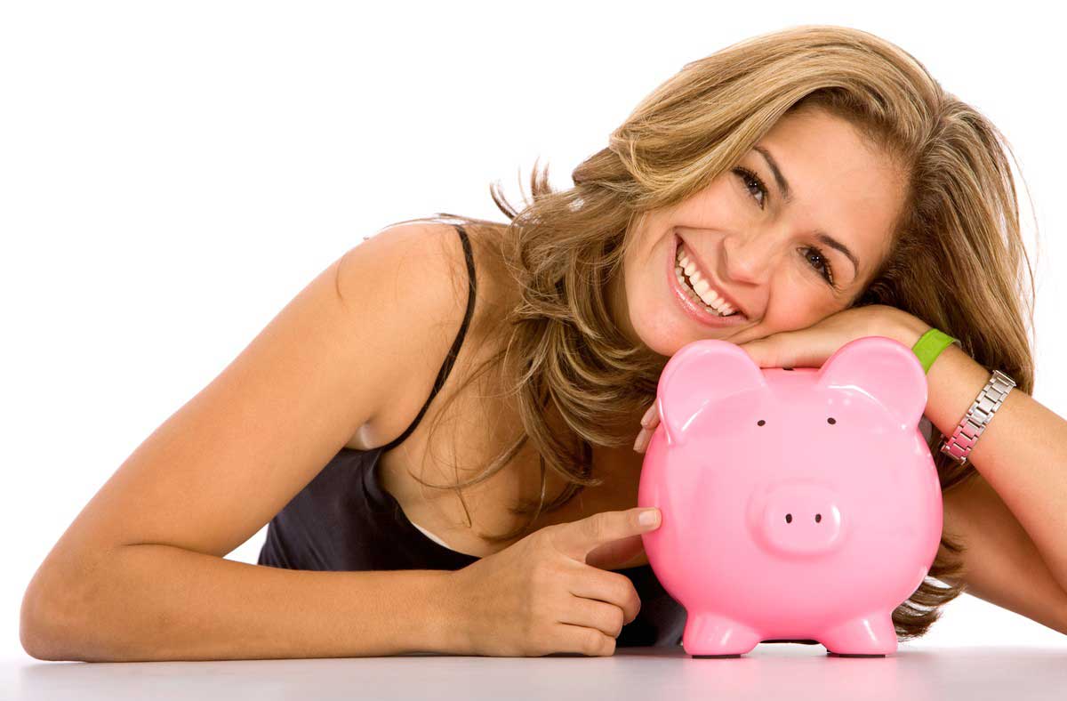 casual woman looking to save money in a piggy bank